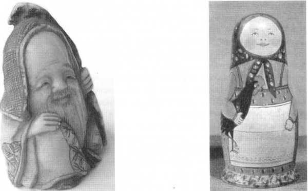 Fukurokudzu. Netsuke, avorio (anni 1900). Prima matrioska con il gallo nero (circa 1900) Image